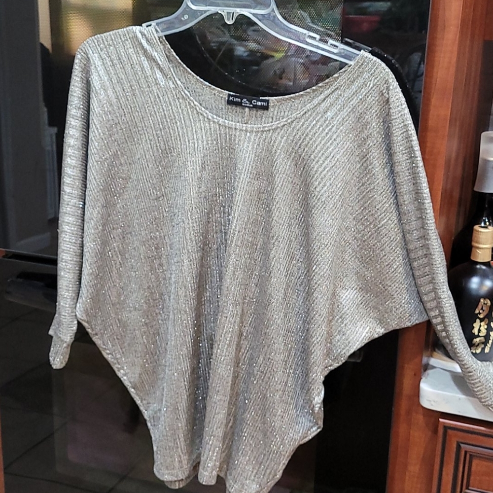 Silver top with 3/4 length sleeves